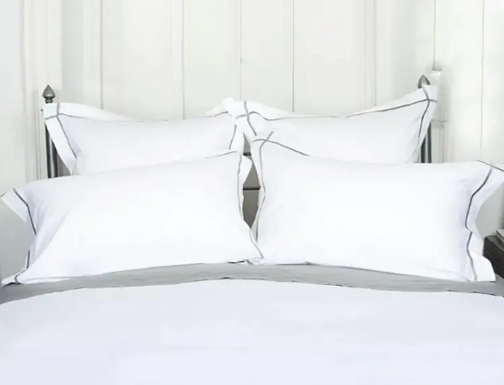 Cosa posso fare se le lenzuola di cotone del mio hotel diventano gialle e diventano più rigide ad ogni lavaggio?